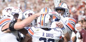 Feature image 2019 College Football Week 13 Over/Under Betting Picks.